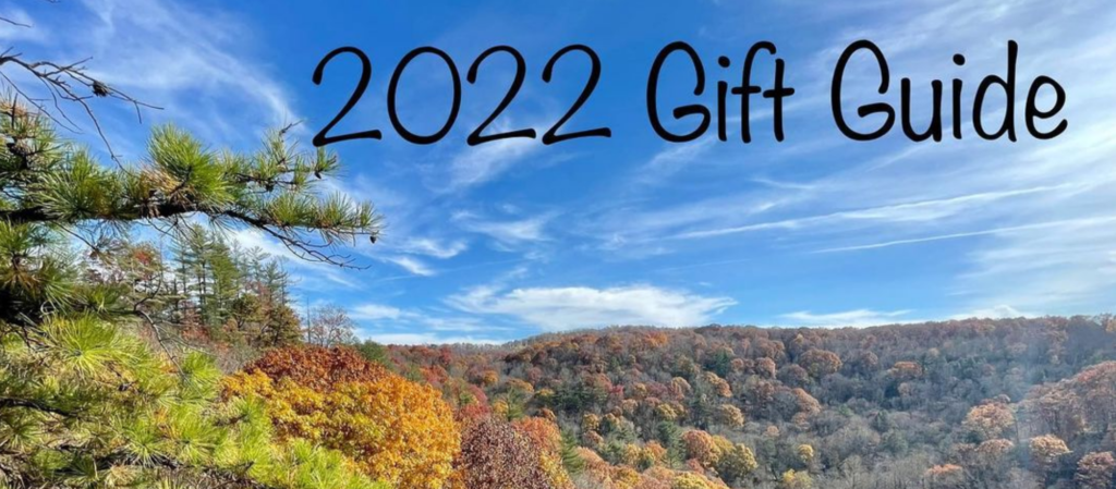 Blue Sky with Colored Leaves and text: 2022 Gift Guide