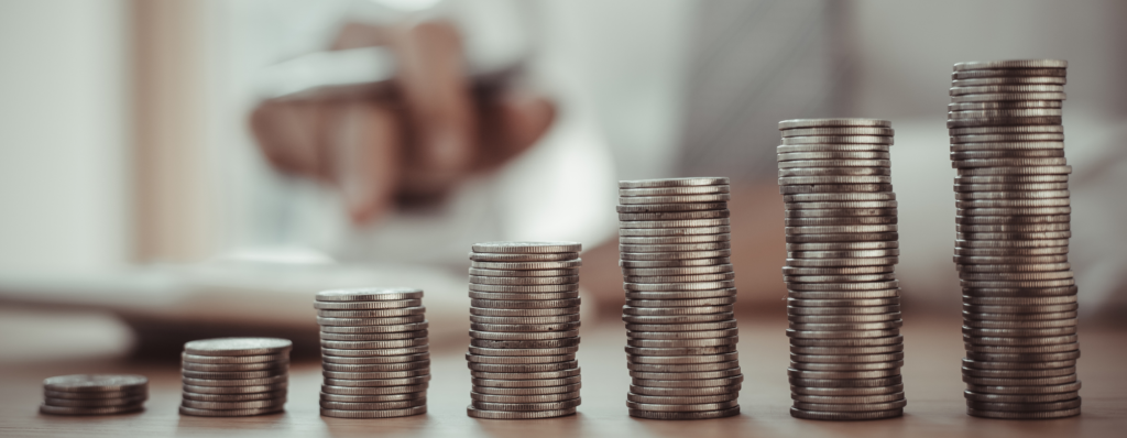 7 stacks of coins in growing size